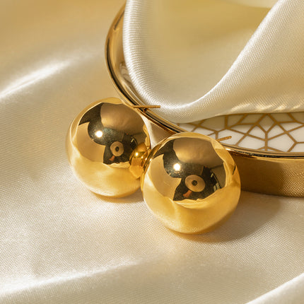 Pendientes de corte hemisférico bañados en oro para mujer