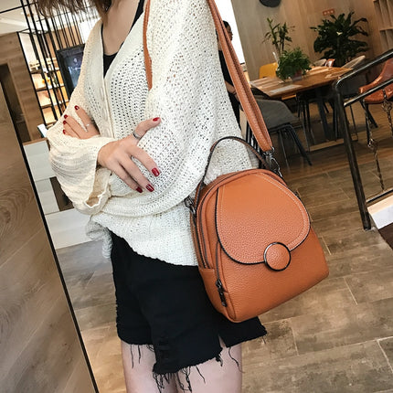 Women's Round Buckle Eco-Leather Backpack - Wnkrs
