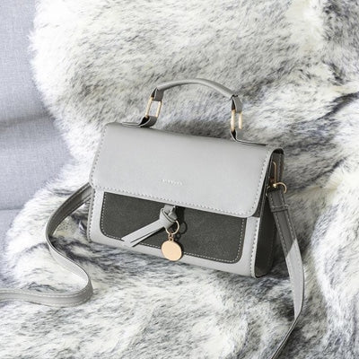 Women's Solid Leather Handbag - Wnkrs