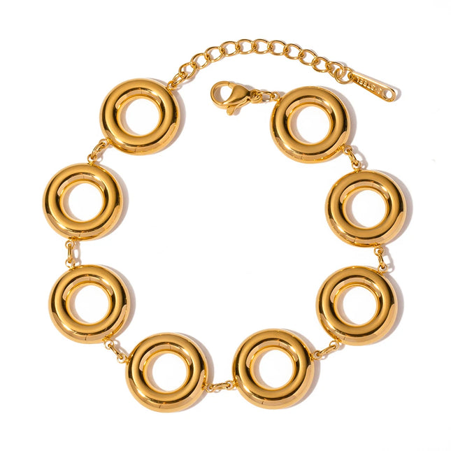 Elegante brazalete de acero inoxidable bañado en oro de 18 quilates con forma de donut