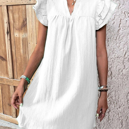 Vestido de mujer de moda con múltiples capas, mangas con volantes y escote en V.