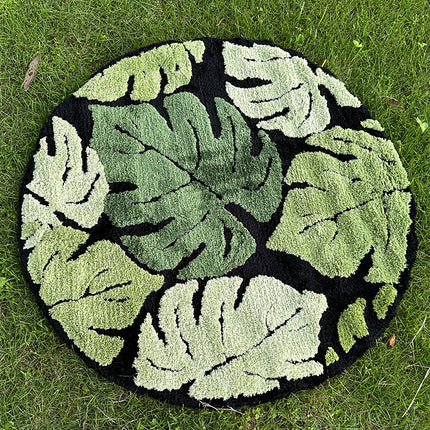 Alfombra de felpa redonda con hojas de monstera verde