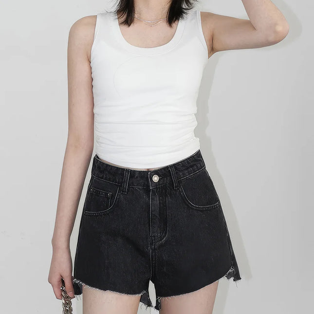 Short en jean taille haute à ourlet asymétrique