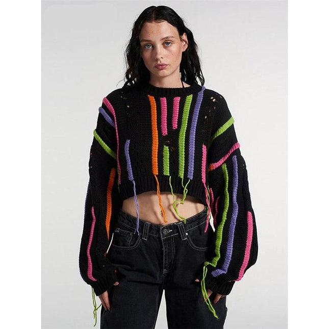 Jersey elegante de punto con borlas