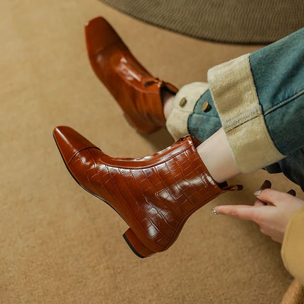 Botas cálidas elegantes de piel auténtica con cremallera frontal