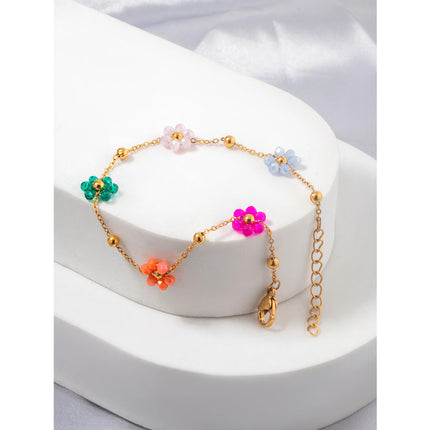 Bracelet en acier inoxydable avec perles et fleurs colorées