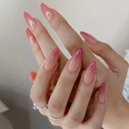 Juego de uñas postizas brillantes con degradado de color rosa almendrado