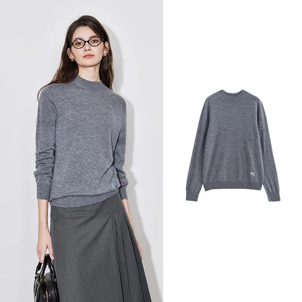 Pull col roulé mi-long en laine pour femme