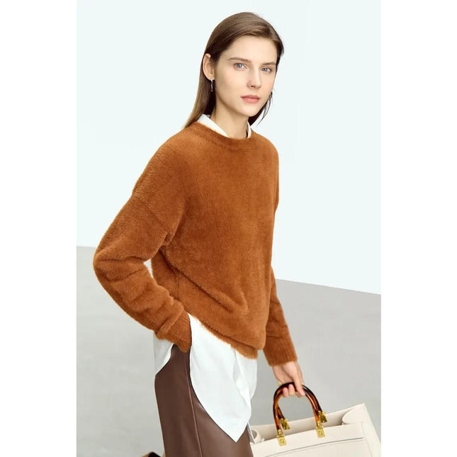Suéter minimalista de cuello redondo y suelto de color sólido