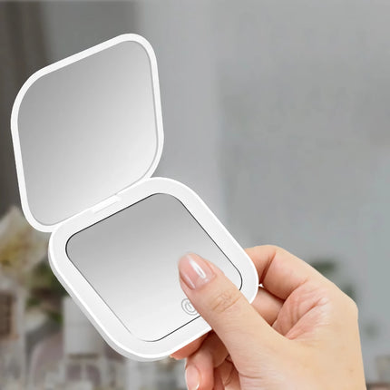 Miroir de maquillage pliable compact avec éclairage LED et grossissement 2X