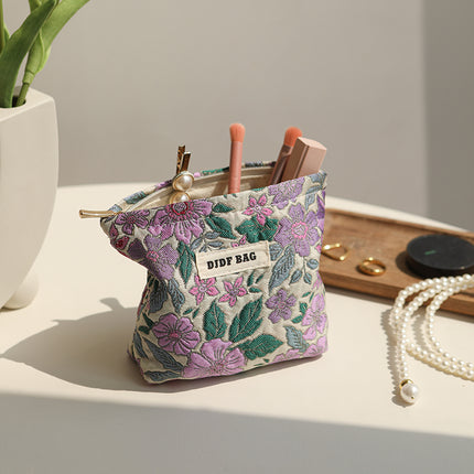 Bolsa de cosméticos vintage con diseño floral