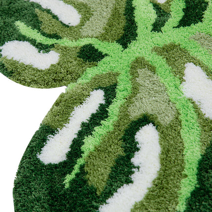 Tapis touffeté à motif de feuilles de Monstera irrégulières