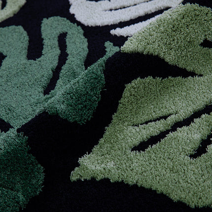 Tapis rond en peluche à motif de feuilles de Monstera vertes