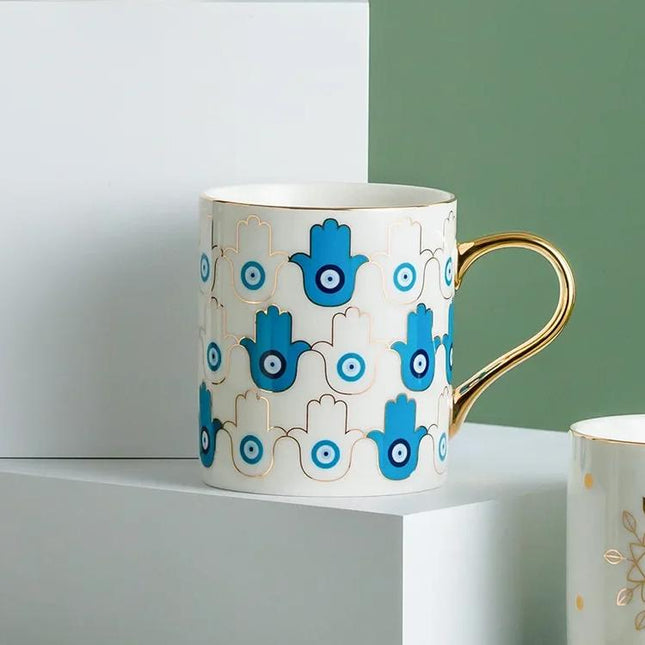 Tasse à café en céramique plaquée or de luxe avec œil du diable