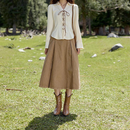 Falda elegante de algodón con tirantes y cintura alta en forma de A