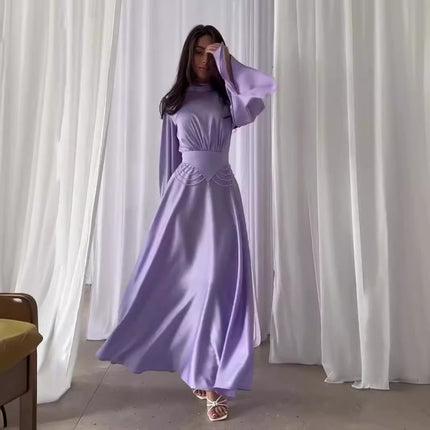 Robe à manches longues de couleur unie à taille serrée