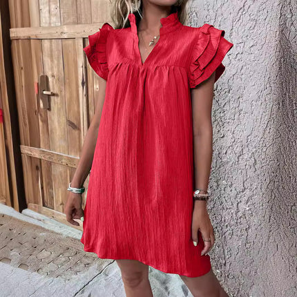 Vestido de mujer de moda con múltiples capas, mangas con volantes y escote en V.