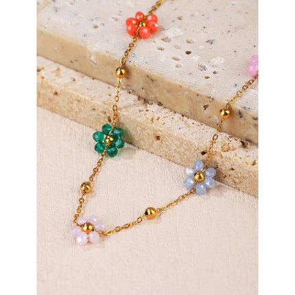 Pulsera de acero inoxidable con cuentas y flores de colores