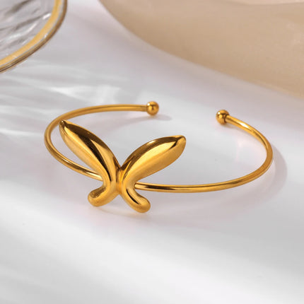 Delicada pulsera con forma de mariposa: brazalete moderno de acero inoxidable dorado