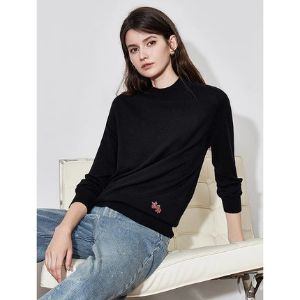 Pull col roulé mi-long en laine pour femme