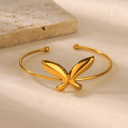 Delicada pulsera con forma de mariposa: brazalete moderno de acero inoxidable dorado