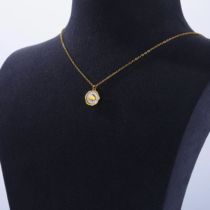 Collar con colgante de corazón de oro con as de espadas