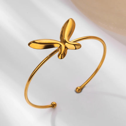 Delicada pulsera con forma de mariposa: brazalete moderno de acero inoxidable dorado