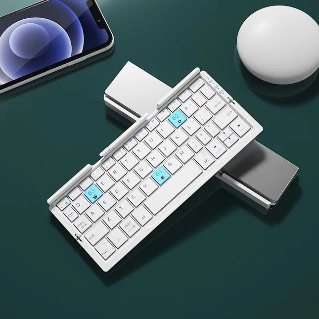 Teclado Bluetooth plegable ultracompacto con soporte integrado para tabletas y teléfonos inteligentes