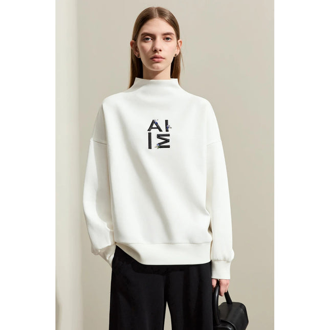 Sudadera con capucha minimalista bordada para mujer