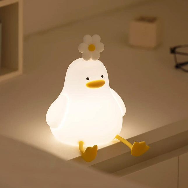 Encantadora luz de noche con forma de pato y flor