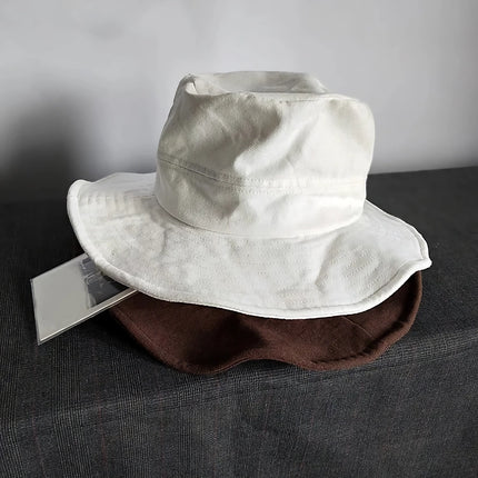 Sombrero de pescador blanco de ala ancha para el sol: protección elegante para exteriores