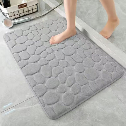 Alfombrilla de baño de espuma viscoelástica con diseño de adoquines en relieve