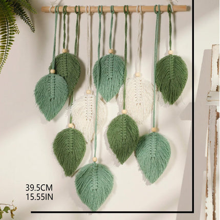 Tapisserie Boho en macramé avec feuilles