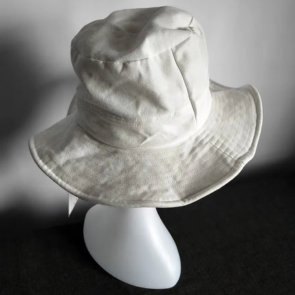 Sombrero de pescador blanco de ala ancha para el sol: protección elegante para exteriores