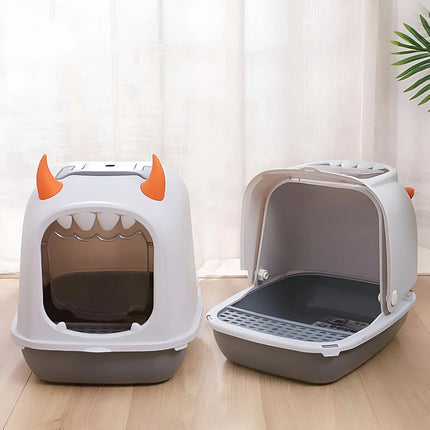 Caja de arena para gatos con forma de concha de monstruo pequeño