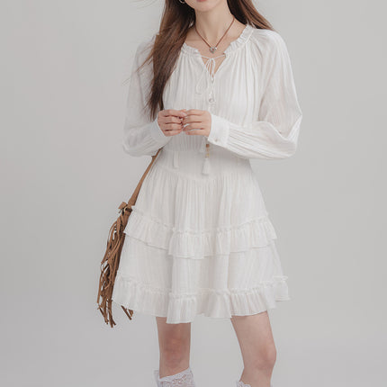 Vestido blanco con borlas atadas de moda para mujer