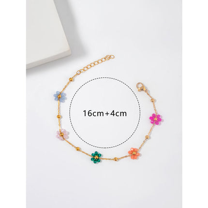 Bracelet en acier inoxydable avec perles et fleurs colorées