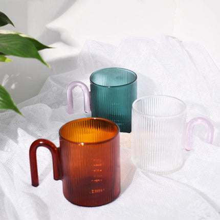 Taza de vidrio resistente al calor con asa de colores