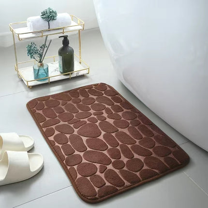 Tapis de bain en mousse à mémoire de forme avec pavés en relief