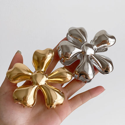 Pinzas para el pelo de metal con diseño floral dorado: accesorios elegantes para el cabello para mujeres