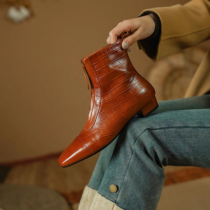 Botas cálidas elegantes de piel auténtica con cremallera frontal