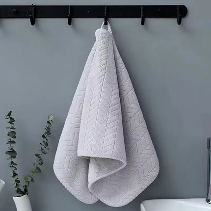 Serviette de bain et de visage en tissu éponge doux et absorbant