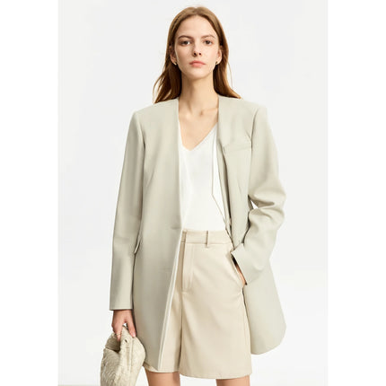 Blazer élégant à col en V avec ceinture et épaulettes