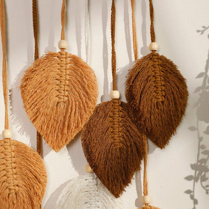 Tapisserie Boho en macramé avec feuilles