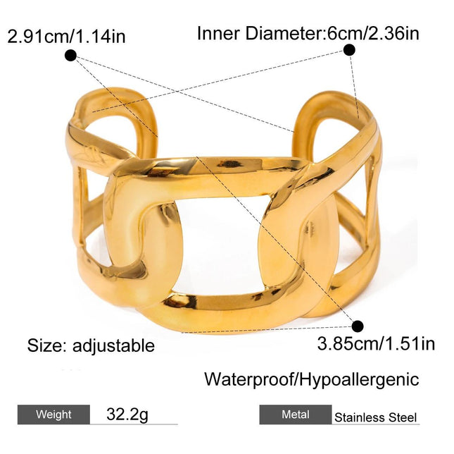 Brazalete abierto ancho de acero inoxidable bañado en oro con forma ovalada