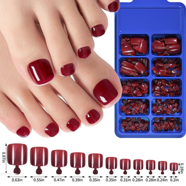 Uñas de los pies elegantes en rosa y rojo