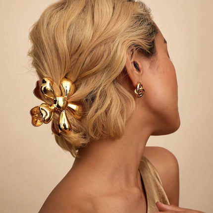 Pinzas para el pelo de metal con diseño floral dorado: accesorios elegantes para el cabello para mujeres