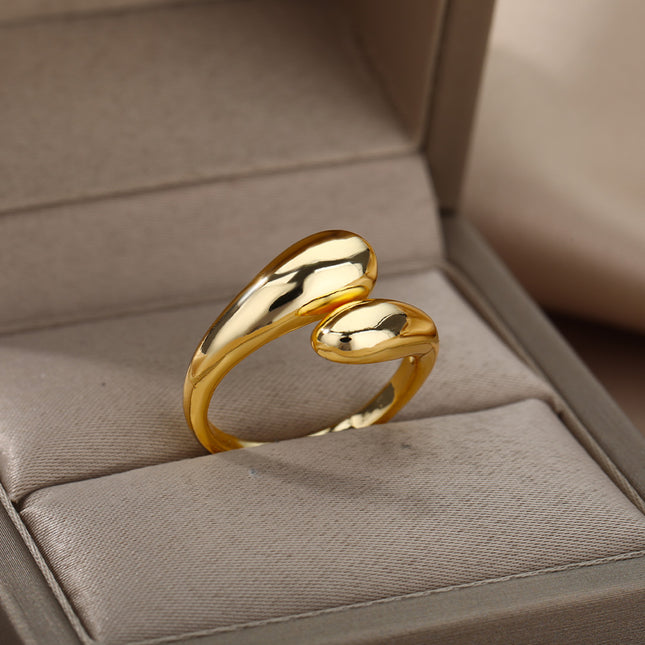 Elegante alianza de boda de acero inoxidable en tono dorado para mujer