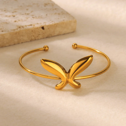 Delicada pulsera con forma de mariposa: brazalete moderno de acero inoxidable dorado