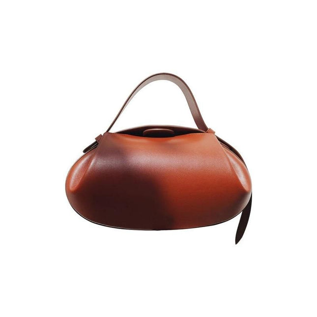 Elegante bolso redondo de piel vegana